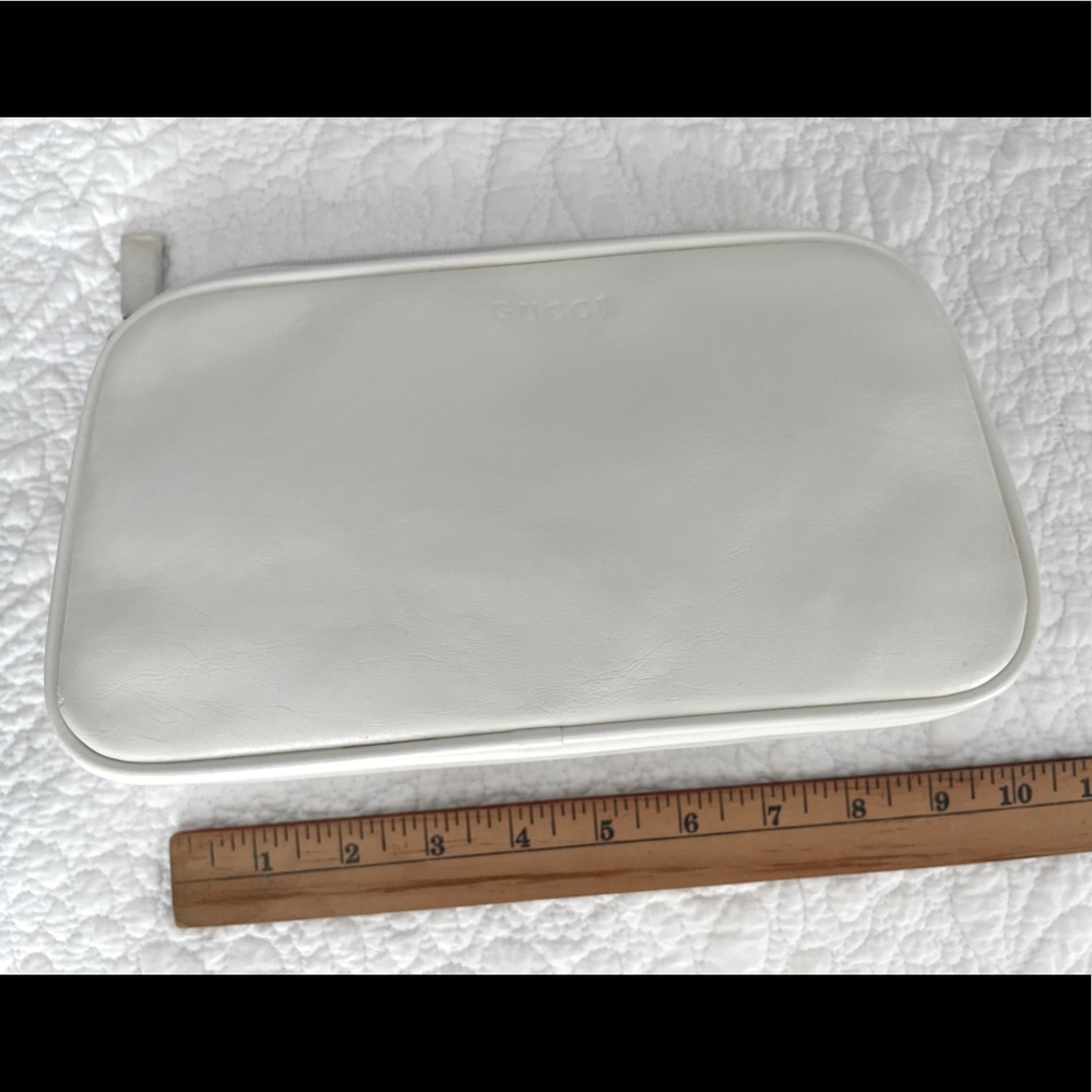 Women’s white leather clutch purse